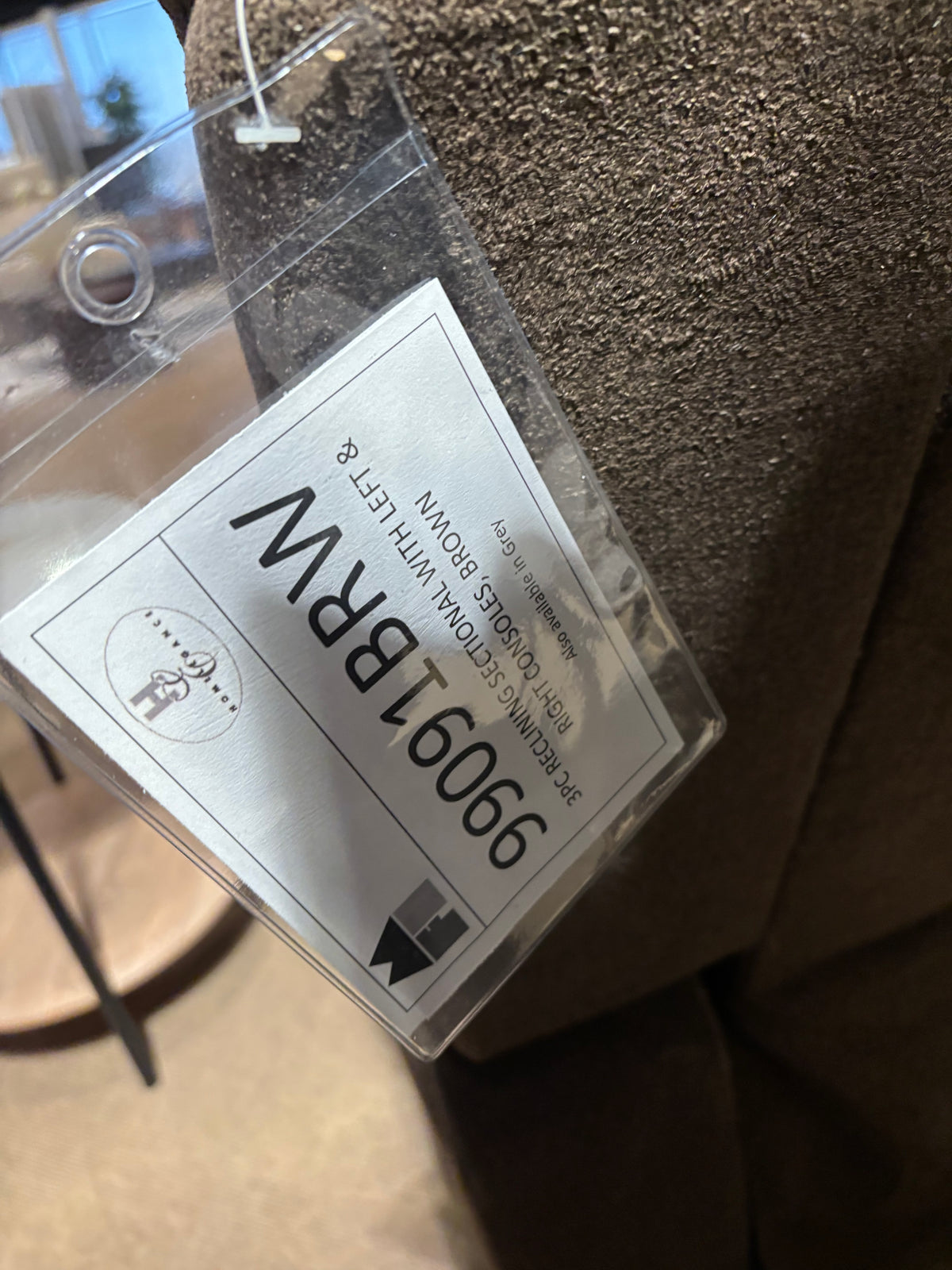 Model 99091BRW brown fabric upholstery detail and product tag
