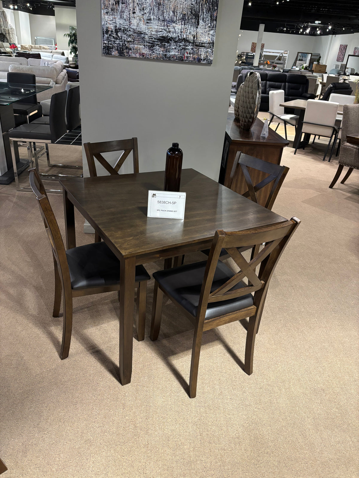Model 5838CH five-piece dining set with dark wood-look table and X-back chairs with black upholstered seats