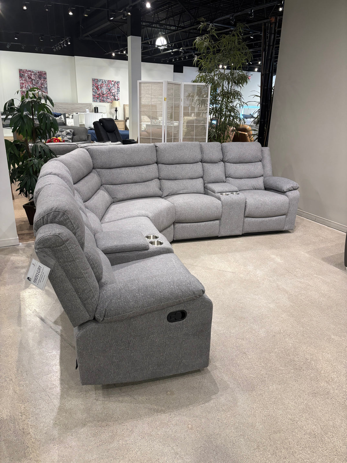 Model 99091GRY grey fabric sectional recliner front view with center console