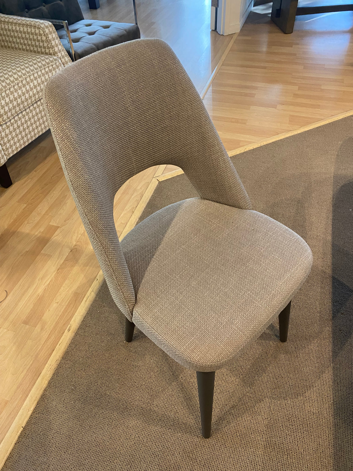 Model Hexagon Italian dining set dining table and upholstered chairs showroom view