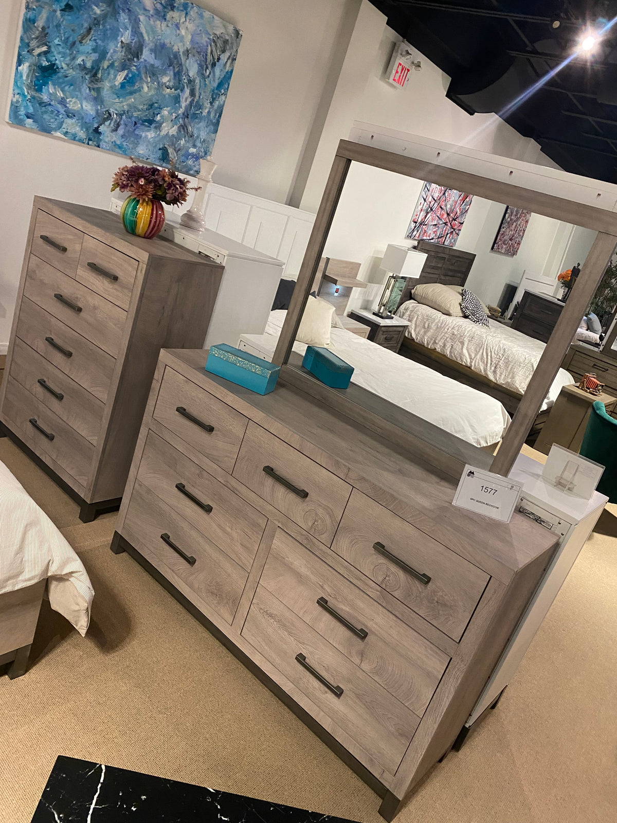 Model 1577 grey six-drawer dresser with framed mirror and matching five-drawer chest