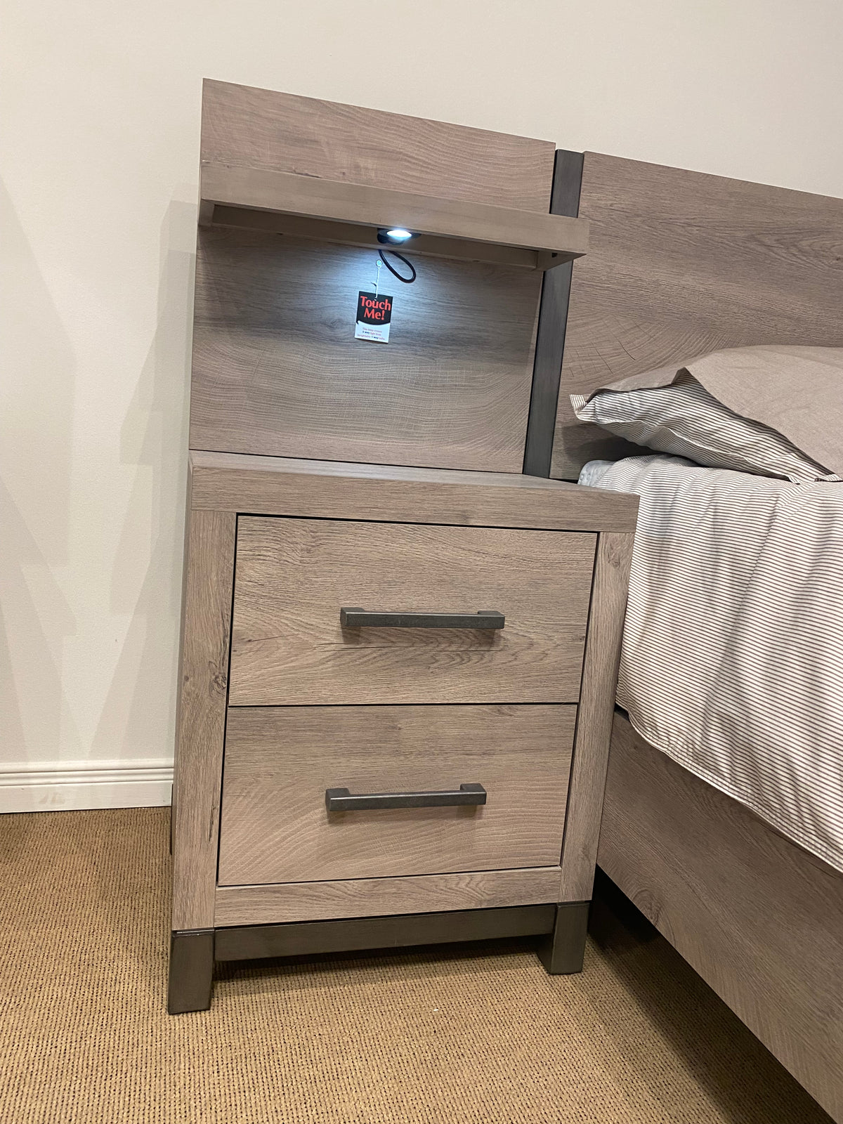 Close-up of Model 1577 integrated two-drawer bedside unit and touch-light headboard shelf
