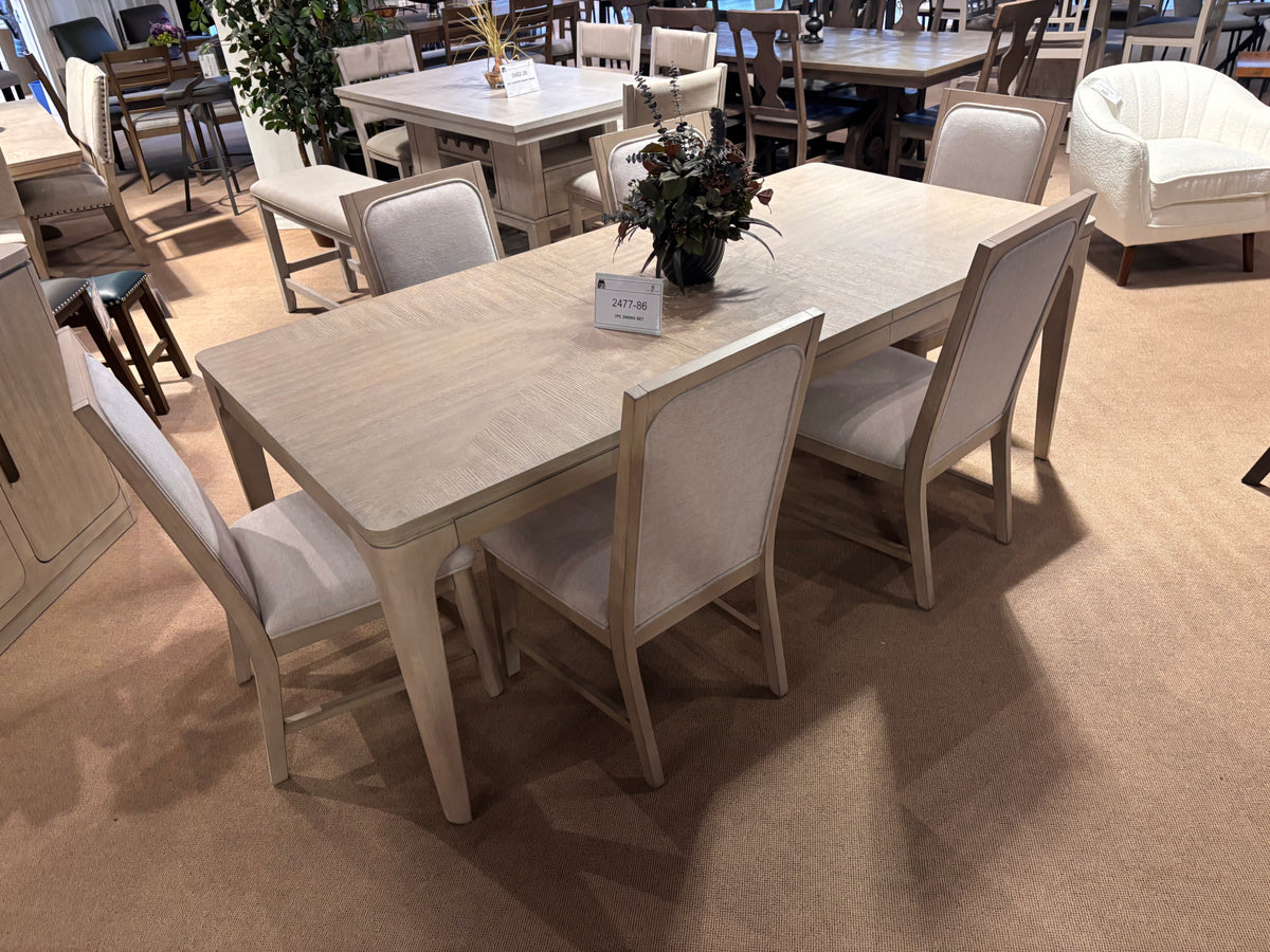 Model 2477 light wood dining table and chairs
