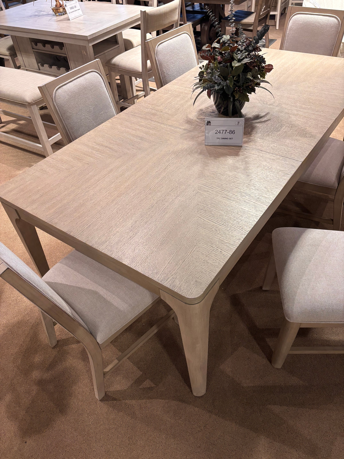 Model 2477 light wood dining set with six chairs