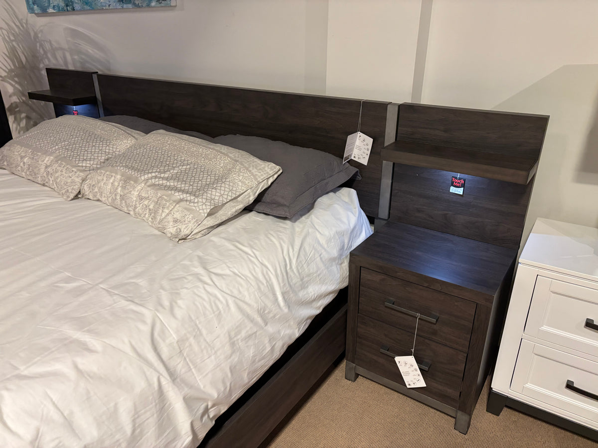 Close-up of Model 1577DG integrated bedside unit and illuminated touch-light headboard shelf