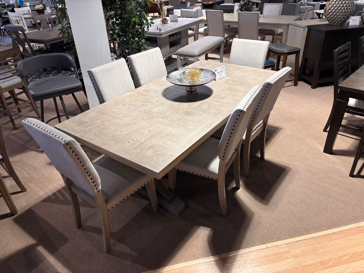 Model 5814 light wood dining table with upholstered chairs