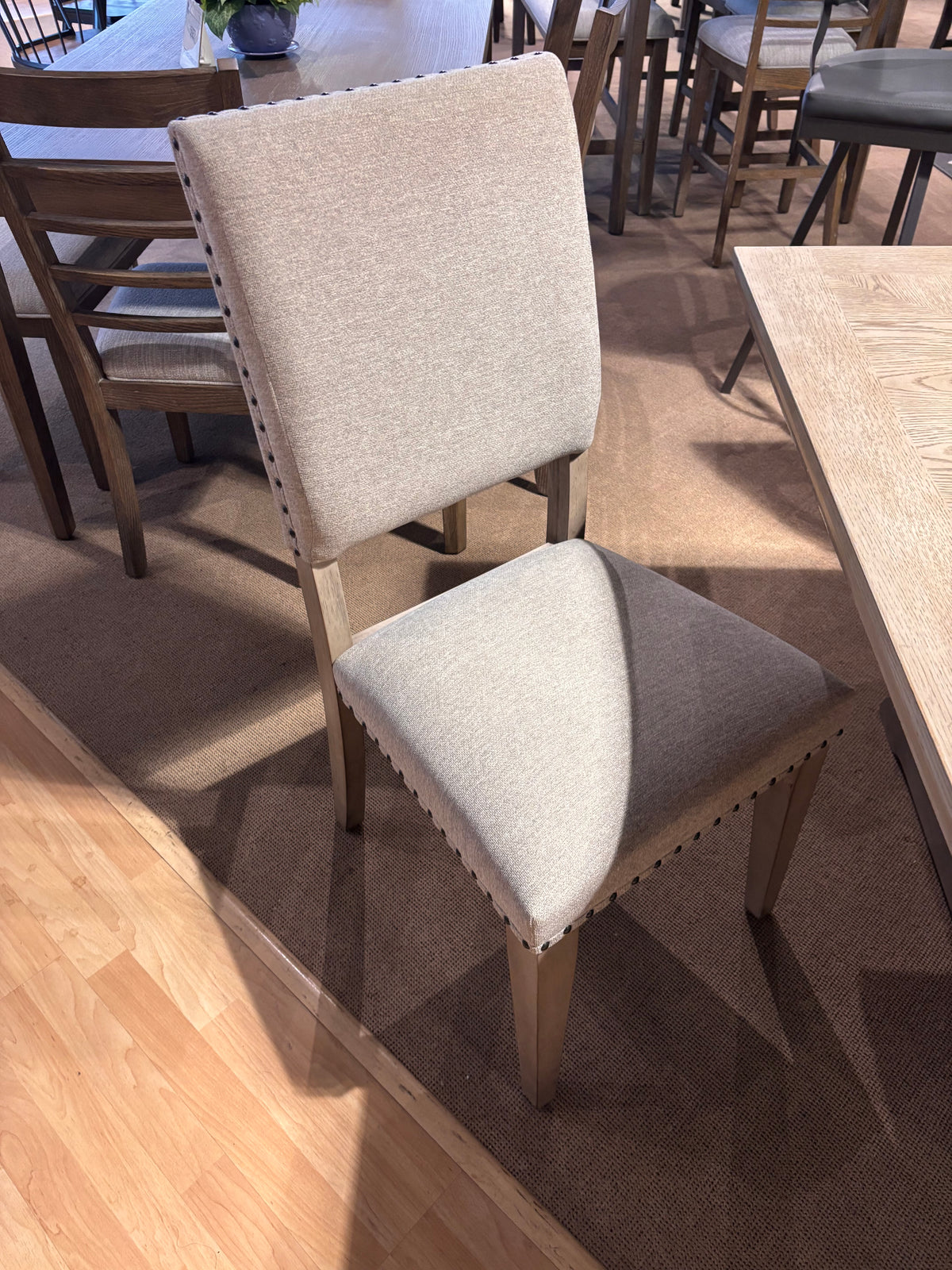 Model 5814 light wood dining set with six upholstered chairs