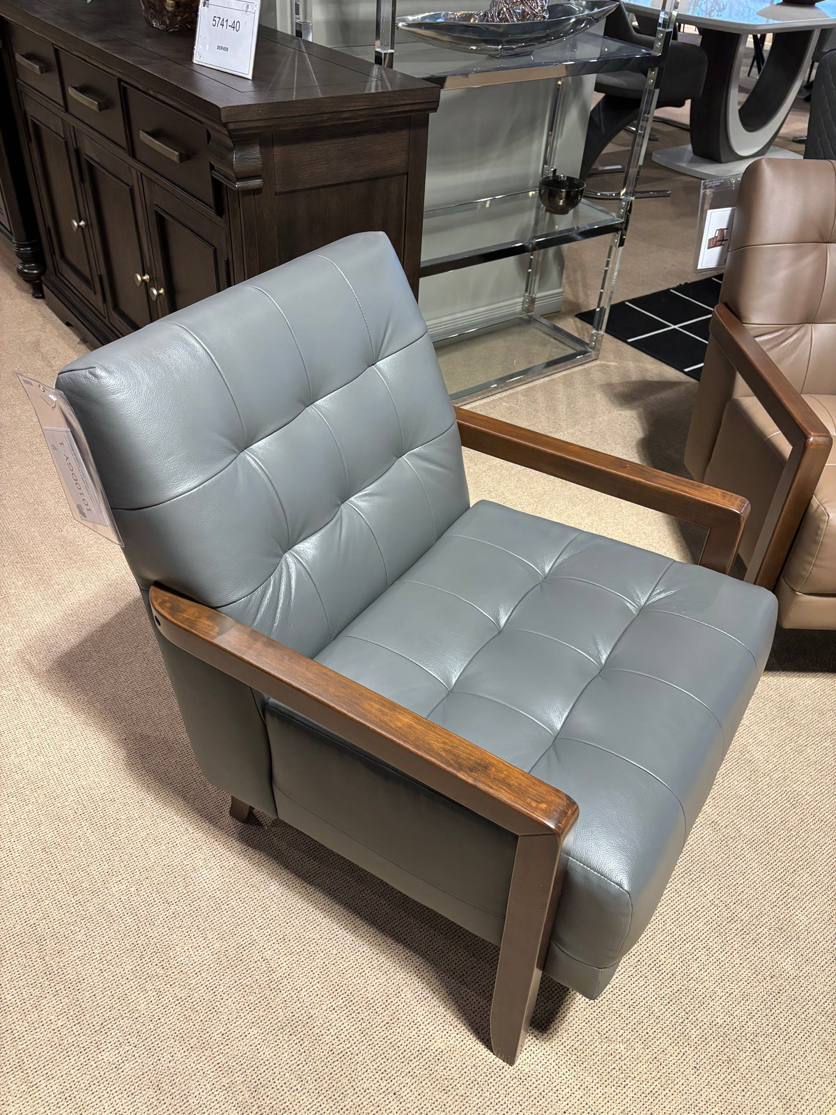 Model 1010 black leather accent chair with tufted cushions and wood arms