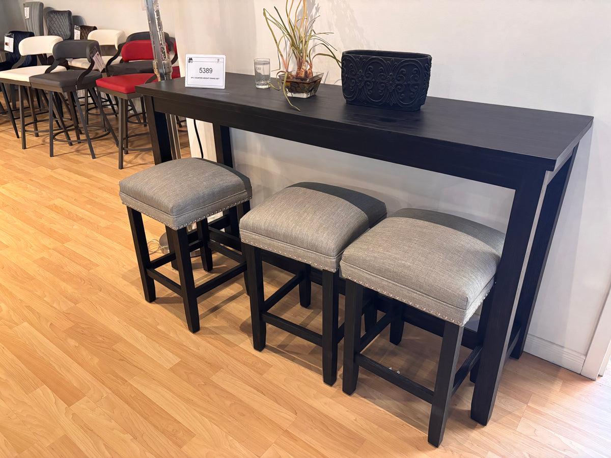 Model 5389 black counter-height table with three upholstered stools