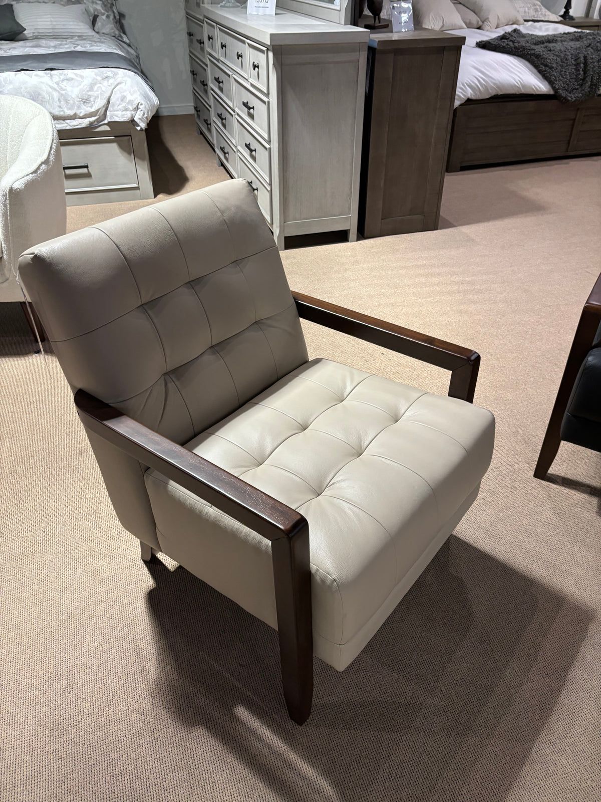 Model 1010 cream leather accent chair with tufted cushions and wood arms