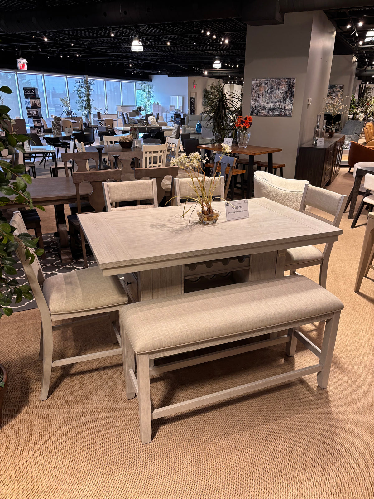 Model 5982-36 counter height dining table with upholstered bench and stools