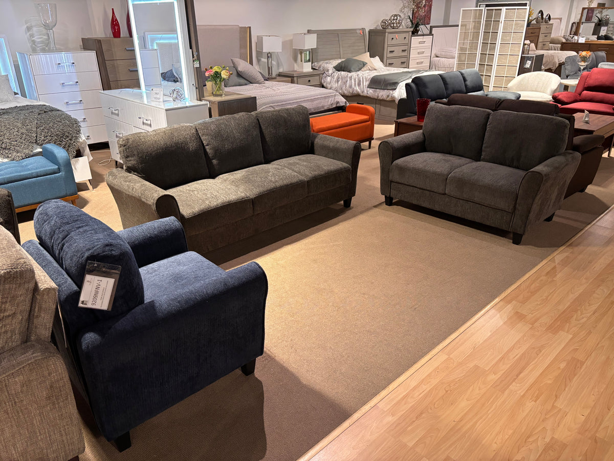 Model 9209NF living room seating shown in grey and blue color options in showroom
