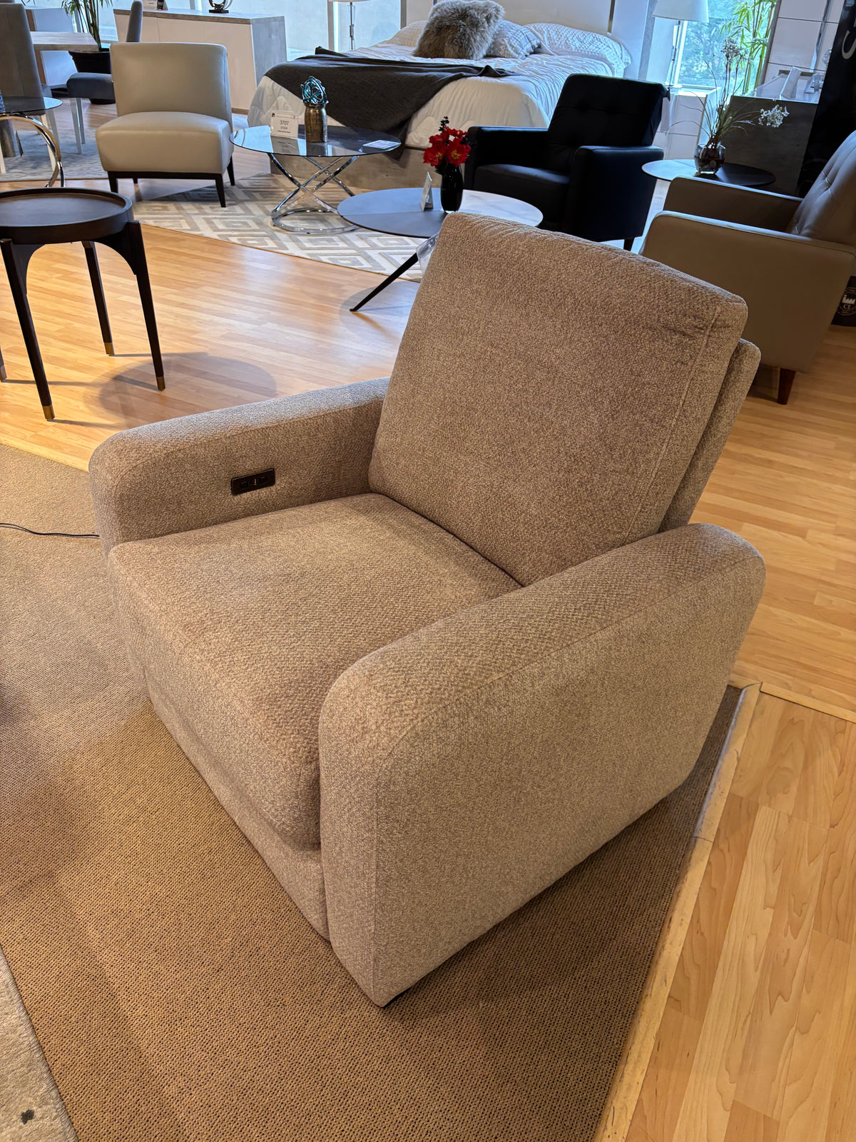 Model 98479 light neutral power recliner chair shown in showroom