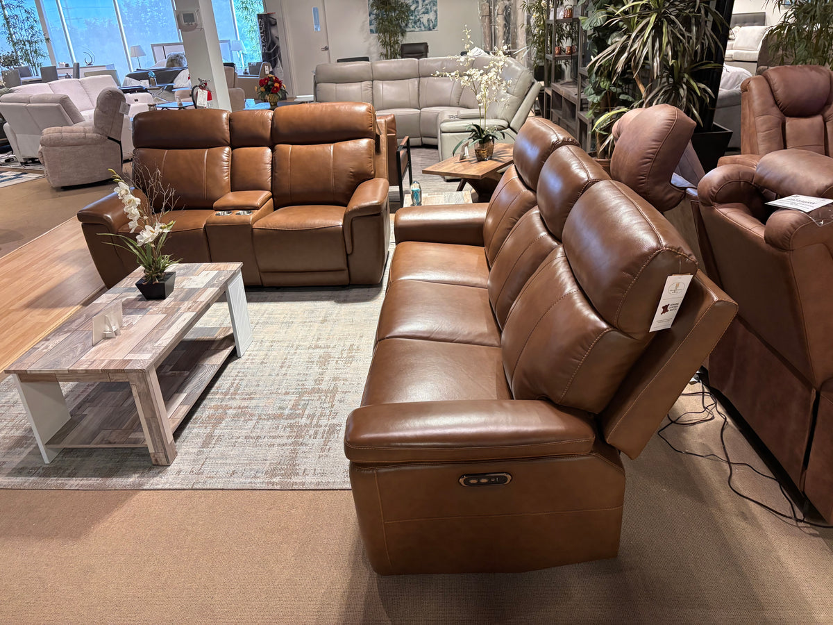 Model 9199BW brown leather dual power reclining sofa and console loveseat displayed in showroom