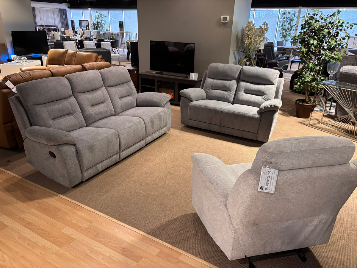 Model 9146 light-grey fabric reclining sofa, loveseat, and recliner chair displayed in showroom