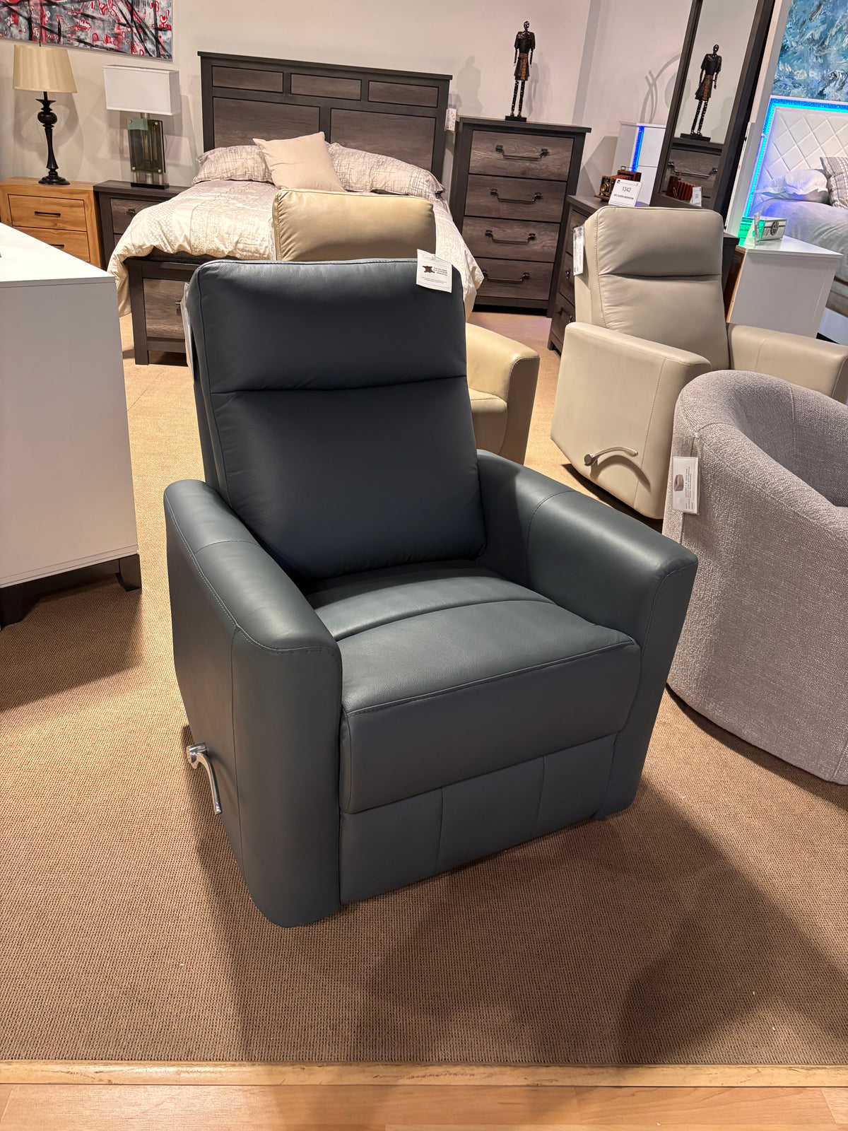 Model 9658 dark leather recliner shown in the Mazin showroom