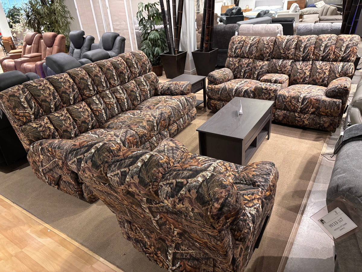 Model 99905 camouflage reclining sofa, loveseat, and chair displayed in the Mazin showroom