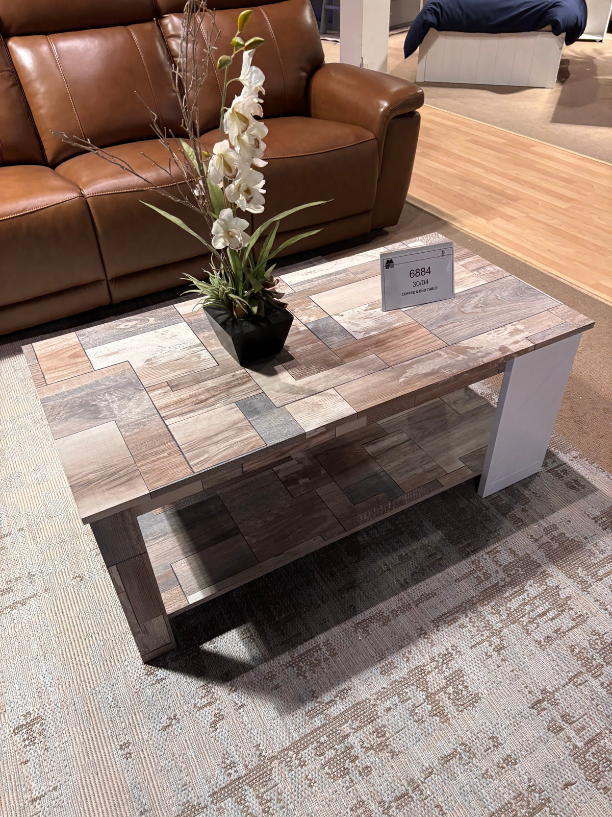 Model 6884 coffee table with multi-tone wood-look top