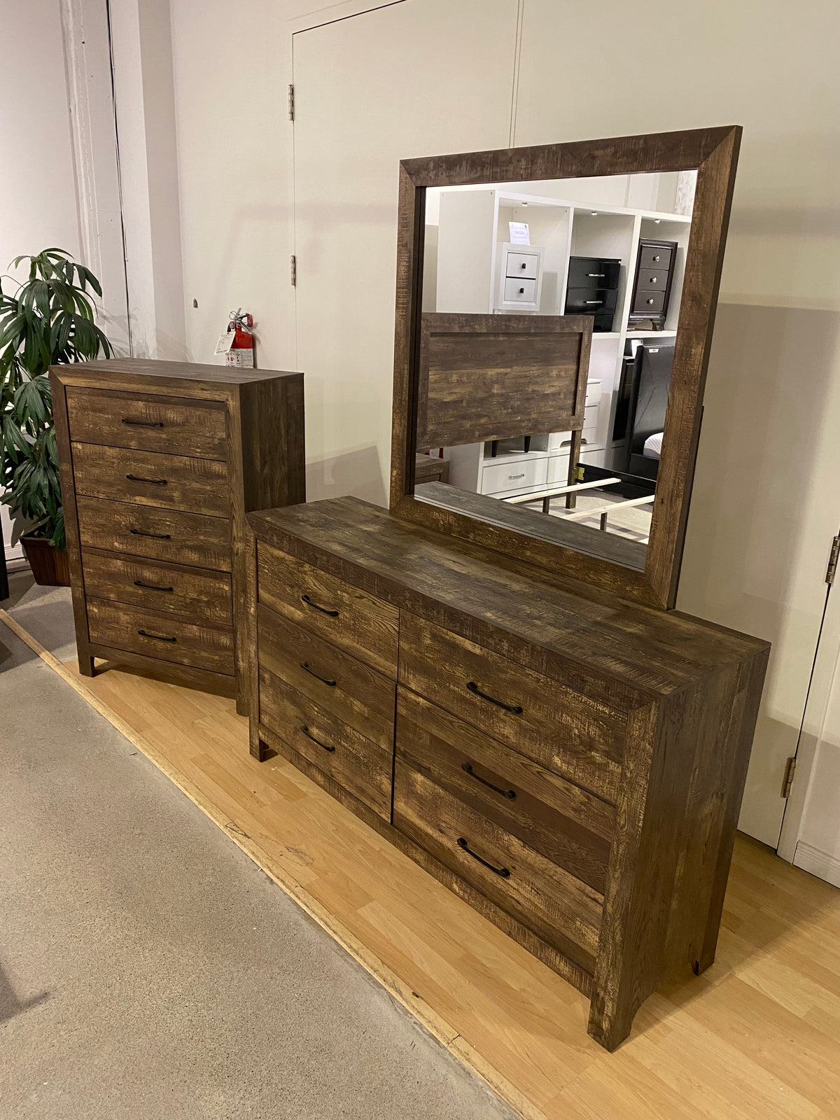Model 1534 rustic brown six-drawer dresser with framed mirror and tall chest