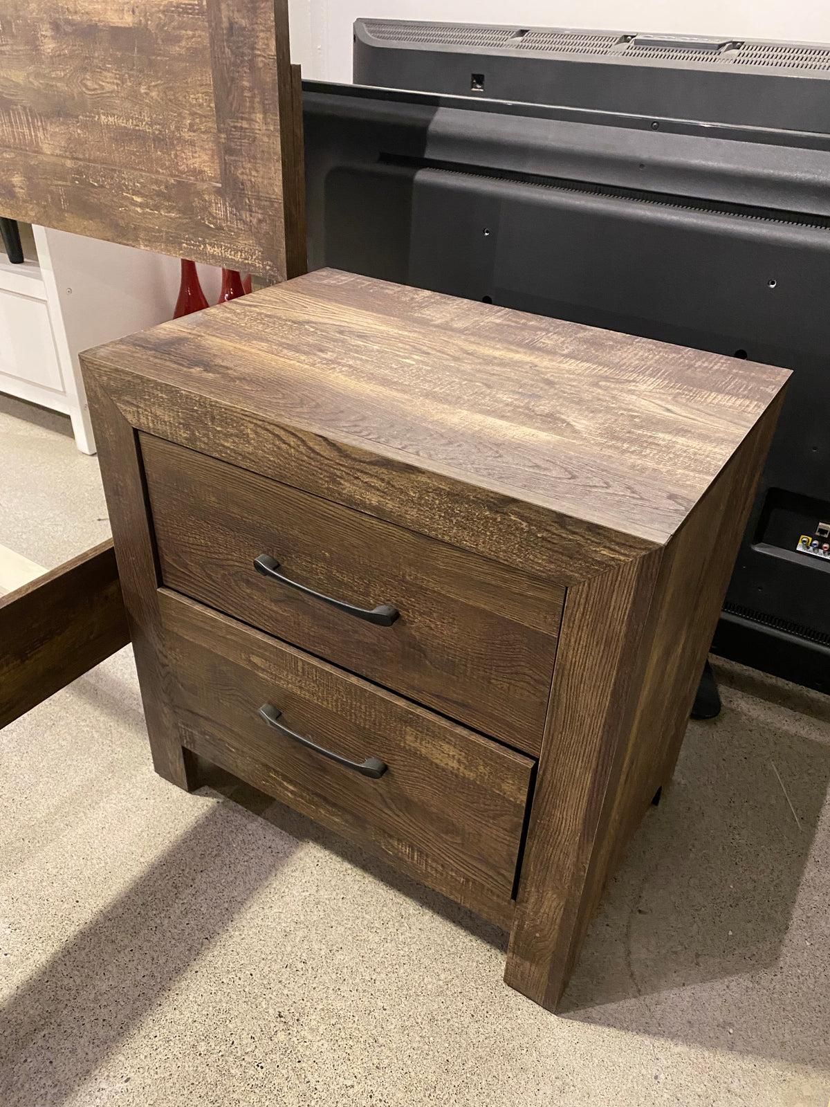 Model 1534 rustic brown two-drawer nightstand with dark metal handles