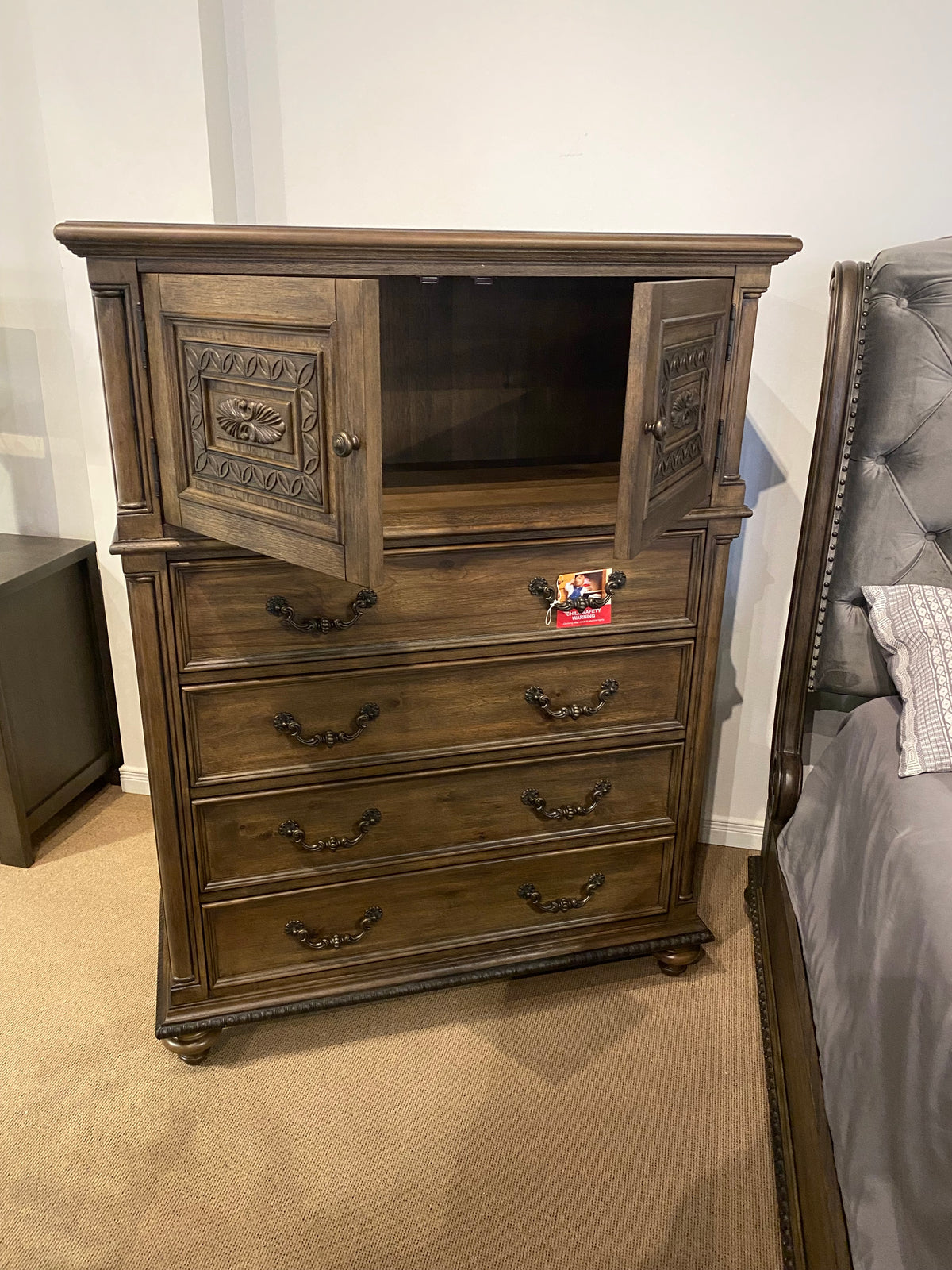 Model 1693 traditional wood door chest shown with upper cabinet doors open and four lower drawers