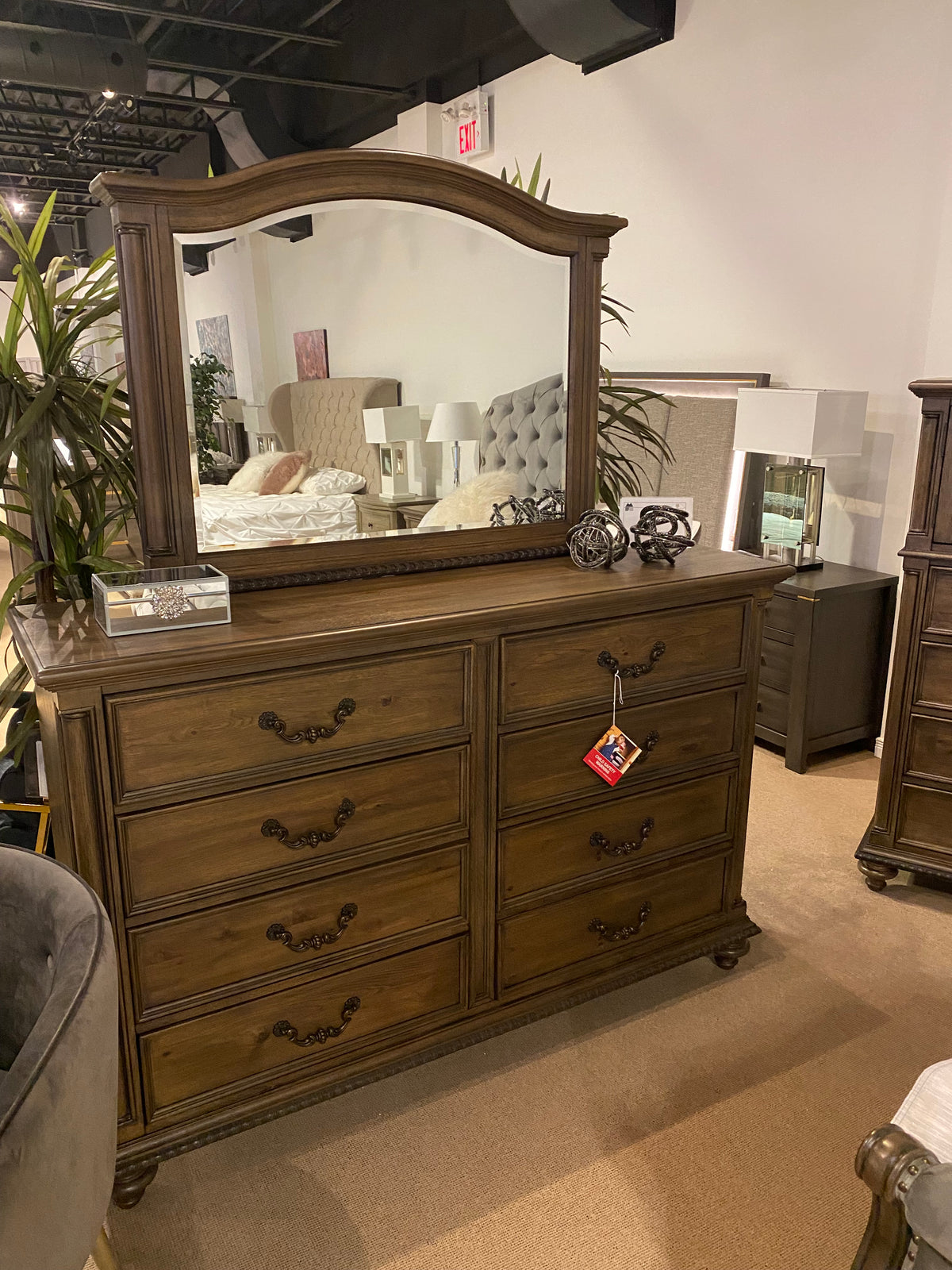 Model 1693 traditional eight-drawer wood dresser with curved framed mirror and ornate metal handles