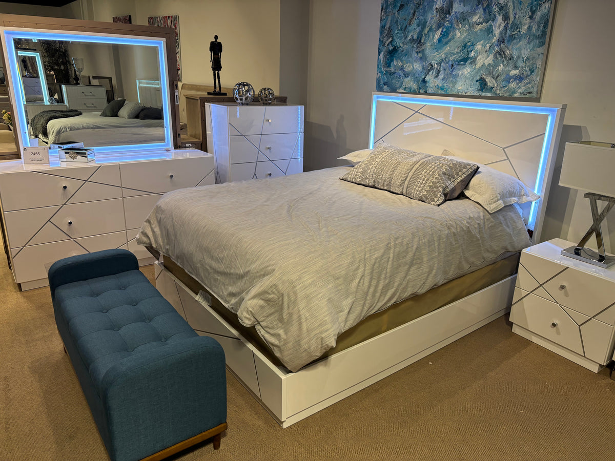 Model 2455 white LED bedroom set with bed, dresser, mirror, nightstand, and chest