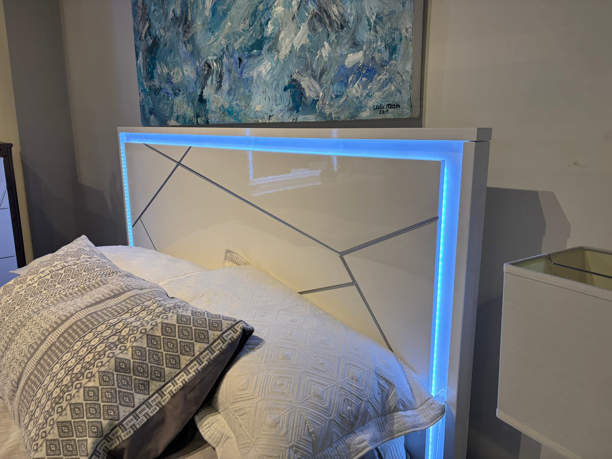 Model 2455 white LED bed with geometric headboard and illuminated trim