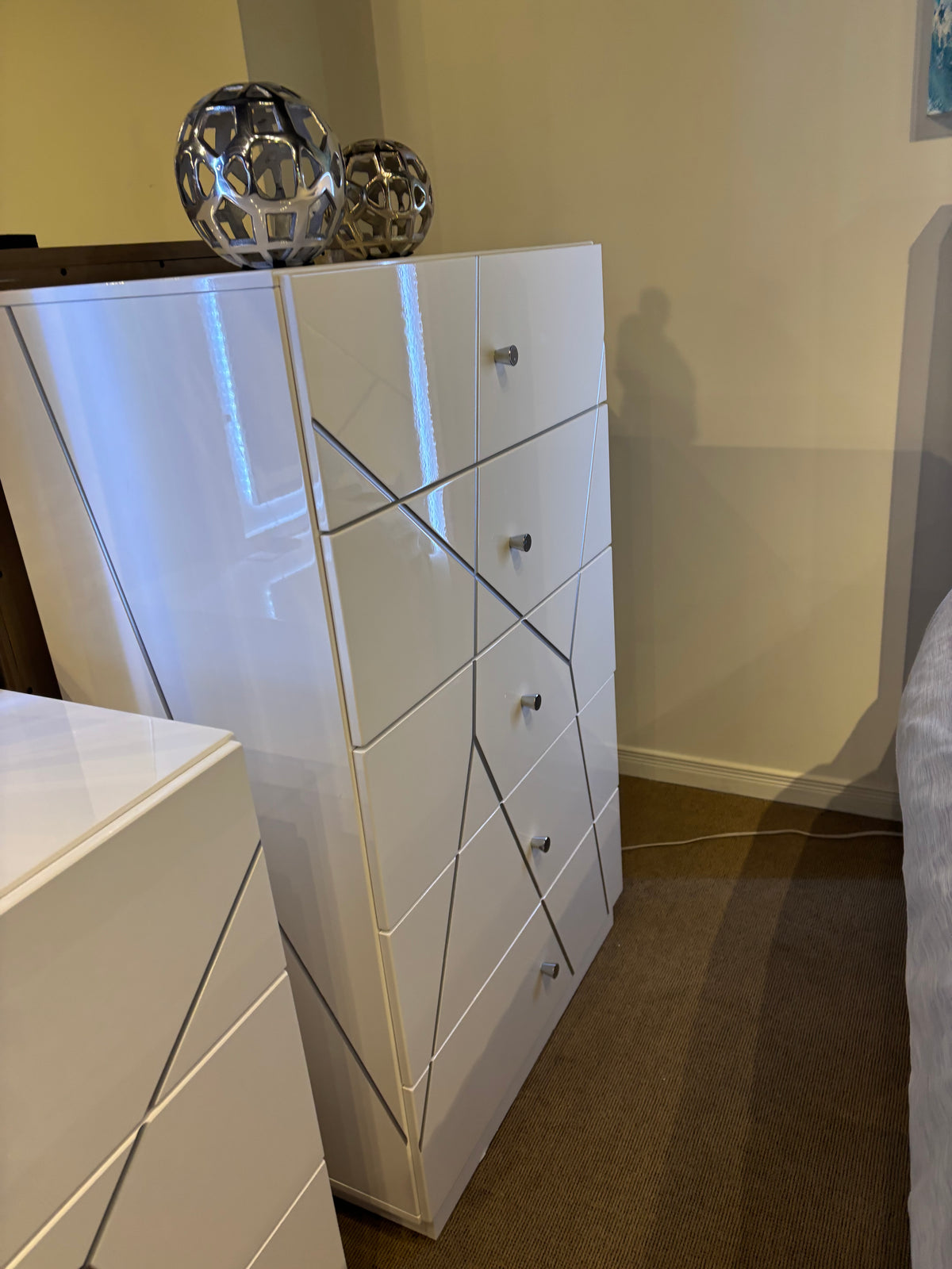 Model 2455 white bedroom chest with geometric drawer fronts