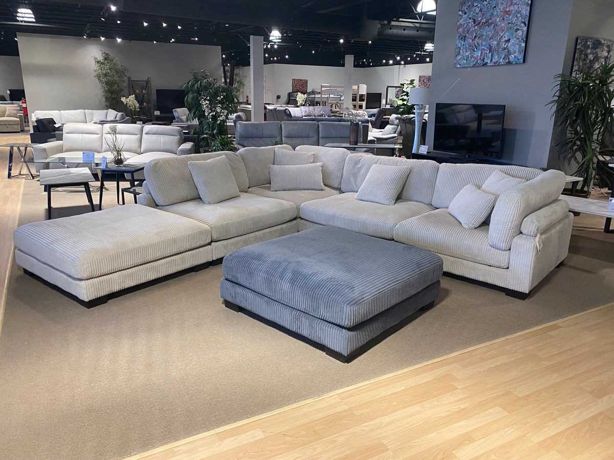 Model 8555 modular corduroy sectional in beige with ottoman