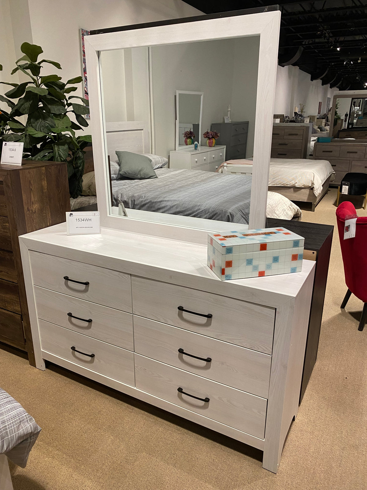 Model 1534WH white six-drawer dresser with framed mirror and dark metal handles