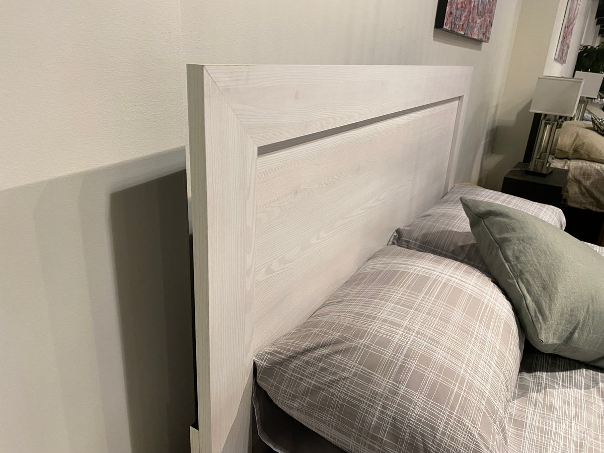 Close-up of Model 1534WH white wood panel headboard