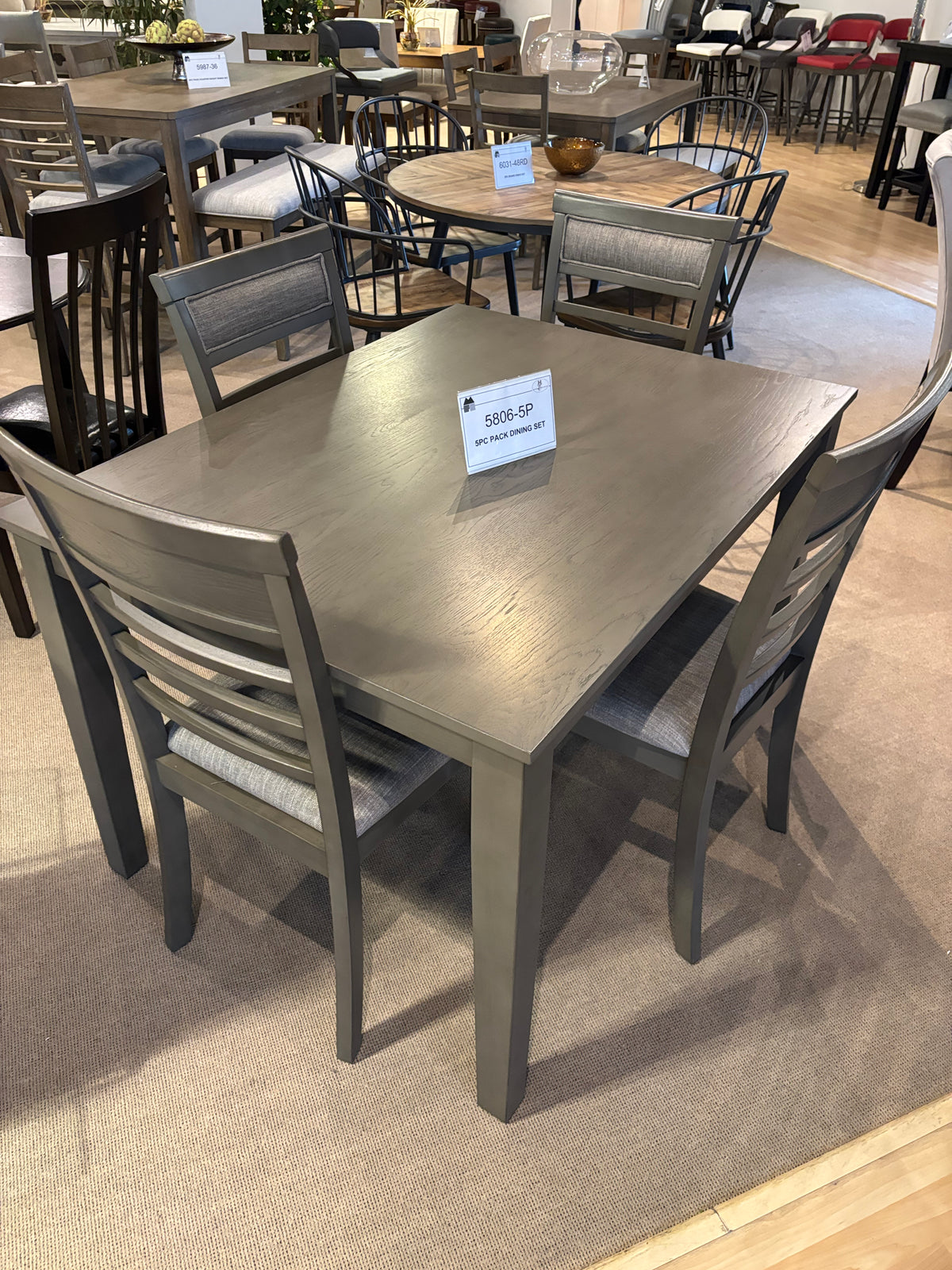 Model 5806 five-piece grey dining set with ladder-back chairs and upholstered seats
